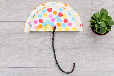 Painted paper plate umbrella